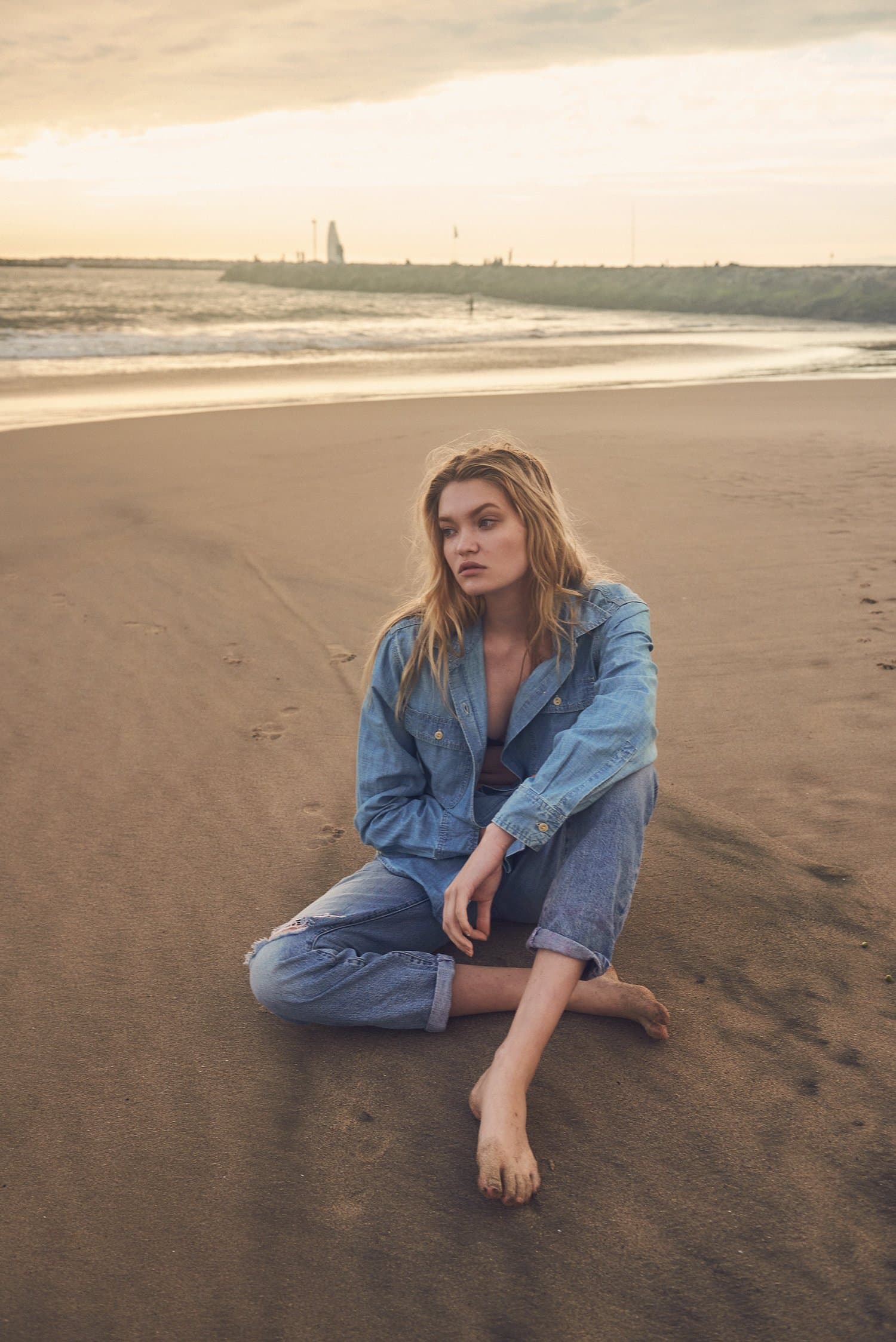 Beach portrait photography, warm tones, editorial